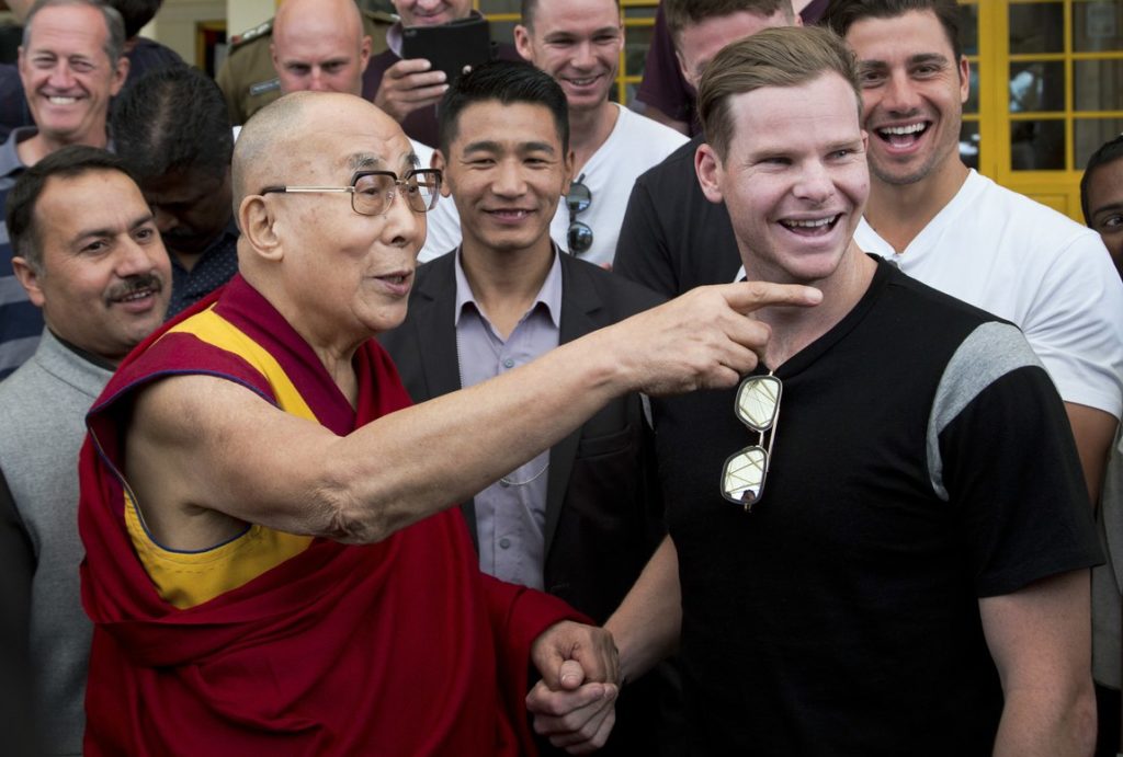 Tibetan spiritual leader the Dalai Lama with Australian captain Steven Smith during an interaction with the team at the Tsuglakhang temple in Dharmsala. (Photo: AP) 