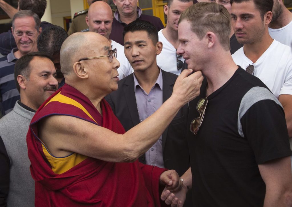 Tibetan spiritual leader the Dalai Lama with Australian captain Steven Smith during an interaction with the team at the Tsuglakhang temple in Dharmsala. (Photo: AP) 