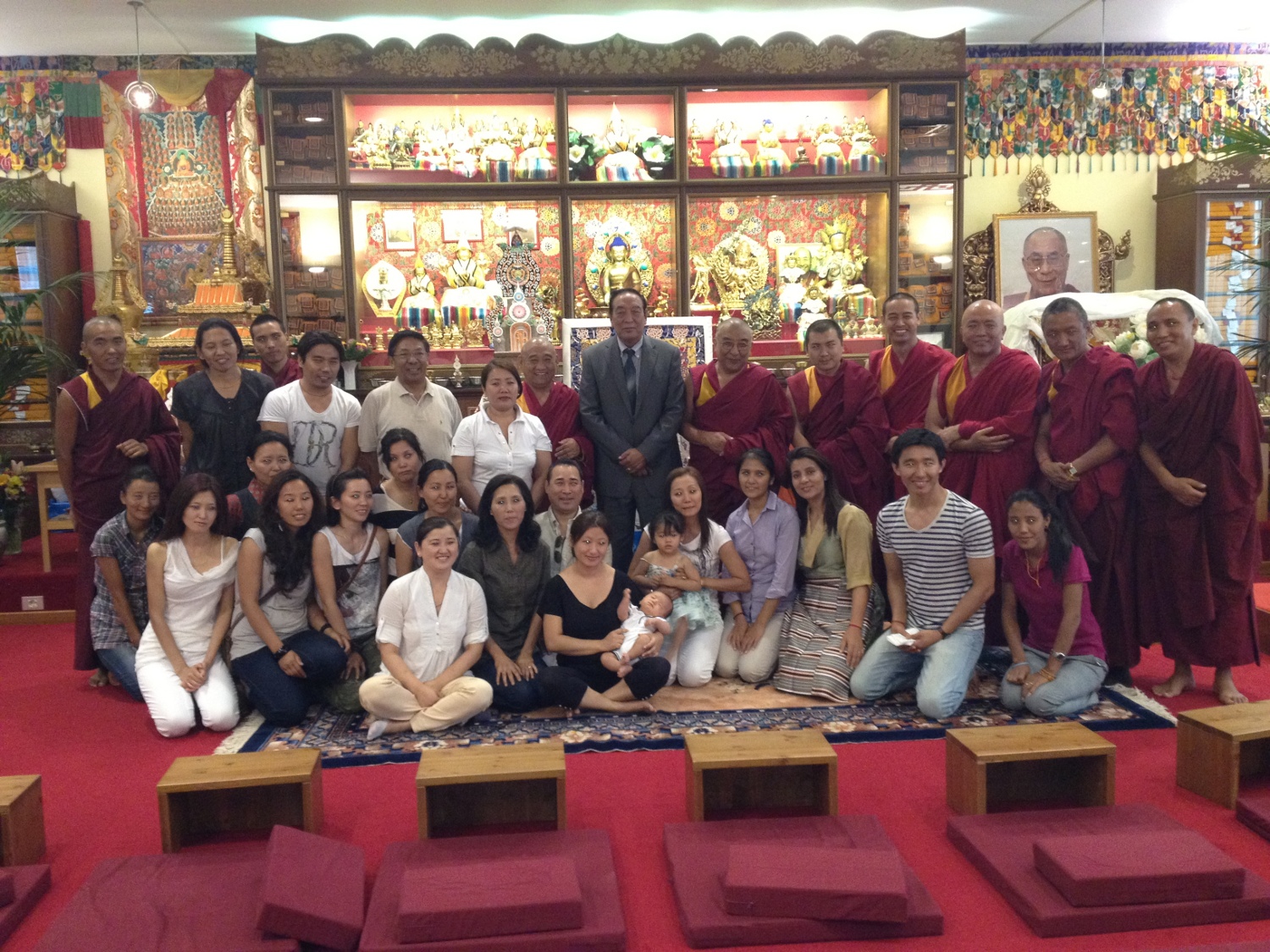 Kalon Pema Chhinjor, Namgyal Monastery Abbot Thamthog Rinpoche and the members of Tibetan community during a meeting in Milan, Italy, on 8 July 2012