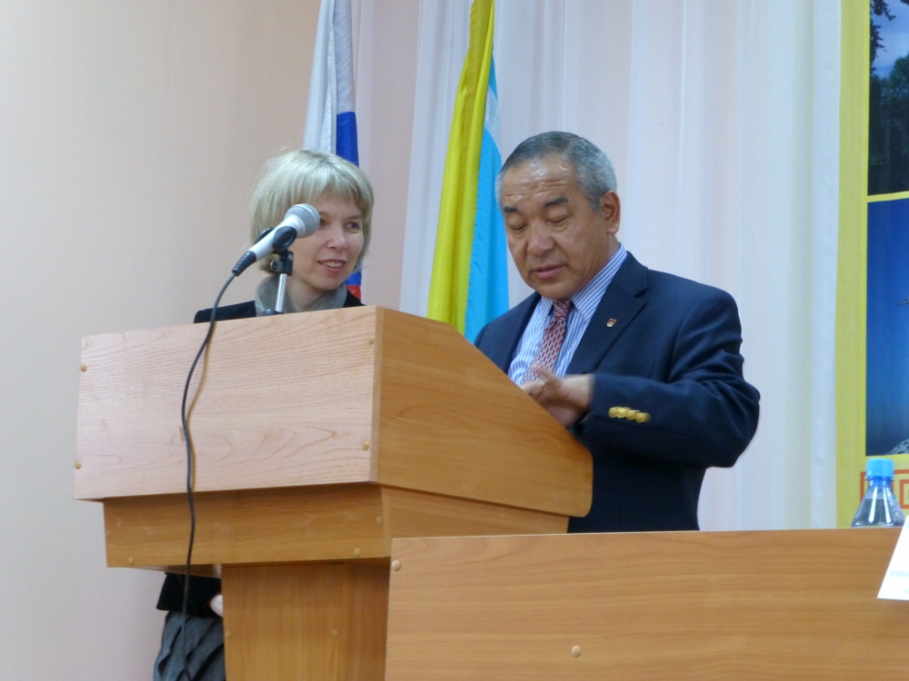 His Holiness the Dalai Lama's Representative Dr Nawang Rabgyal (R) addressing the gathering