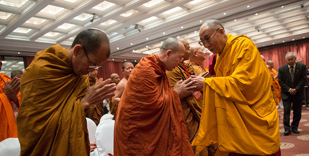 His Holiness the Dala Lama greeting members of the Thai monastic community on his arrival of the second day of the dialog with Thai Buddhist scholars in New Delhi, India, on 16 December 2012/Photo/OHHDL/Tenzin Choejor