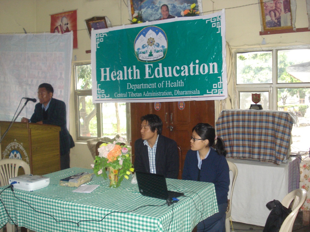 Two Health Department staff, Tenzin Kapsang (C) and Tenzin Yangchen R), during the mobile health education programme at Tibetan settlement at Lakhanwala in Uttrakhand