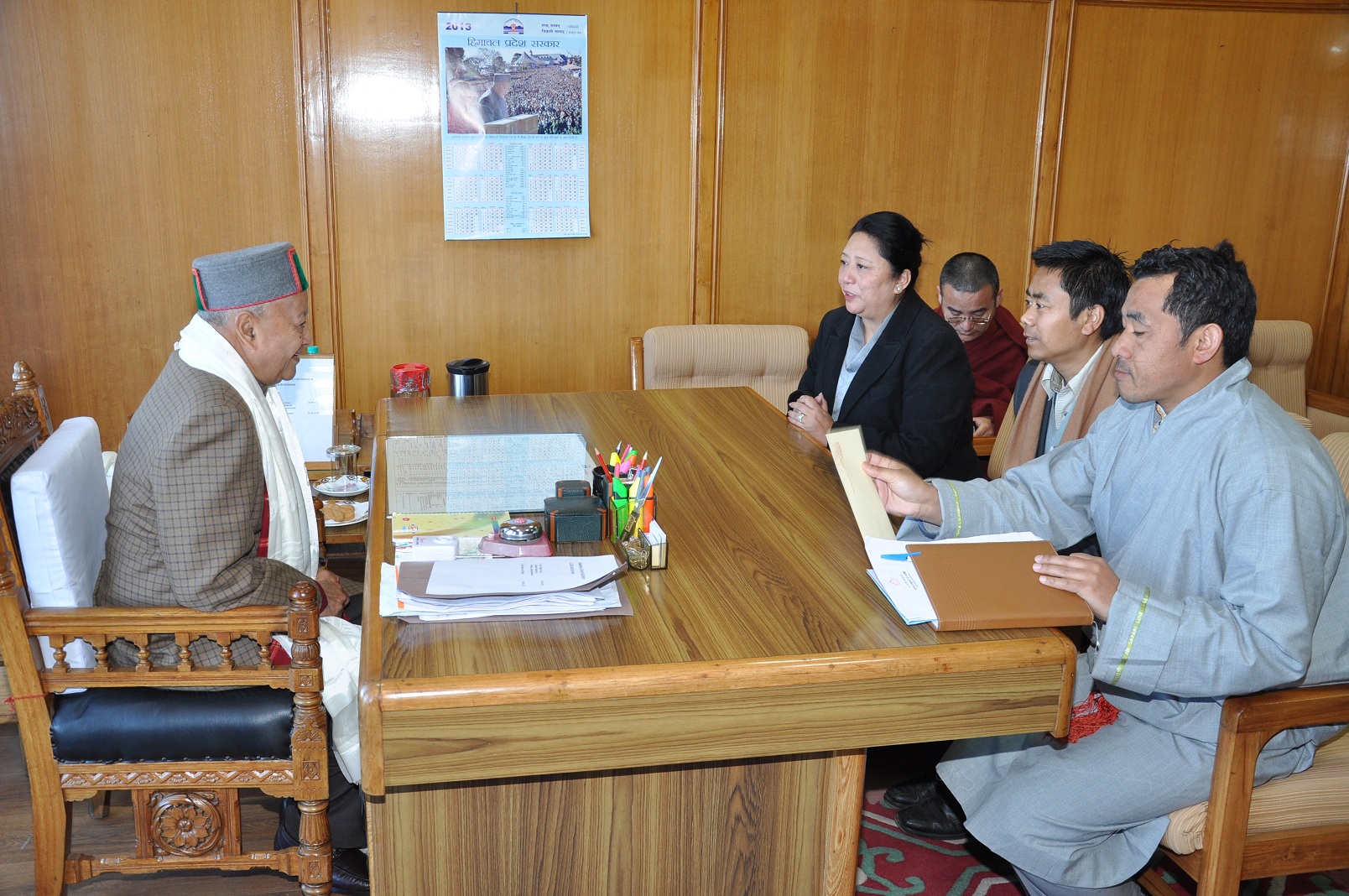 Chief Minister Virbhadra Singh listen to Kalon Dolma Gyari, Shimla Tibetan Settlement Officer Tsering Tashi and Dharamsala Tibetan Settlement Officer Sonam Dorjee during a meeting in Shimla, India, on 1 March 2013