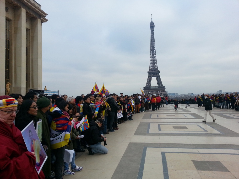 Tibetans commemorate the 54th National Uprising Day near Eiffel Tower in Paris on 10 March 2013
