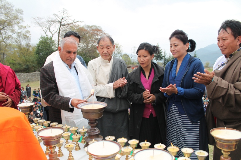 Mr Gulab Singh, a member of legislative assembly of Himachal Pradesh, light a butter lamp to express Indian people's solidarity with Tibetans on the 54th Tibetan National Uprising Day at Chauntara near Dharamsala, India, on 10 March 2013