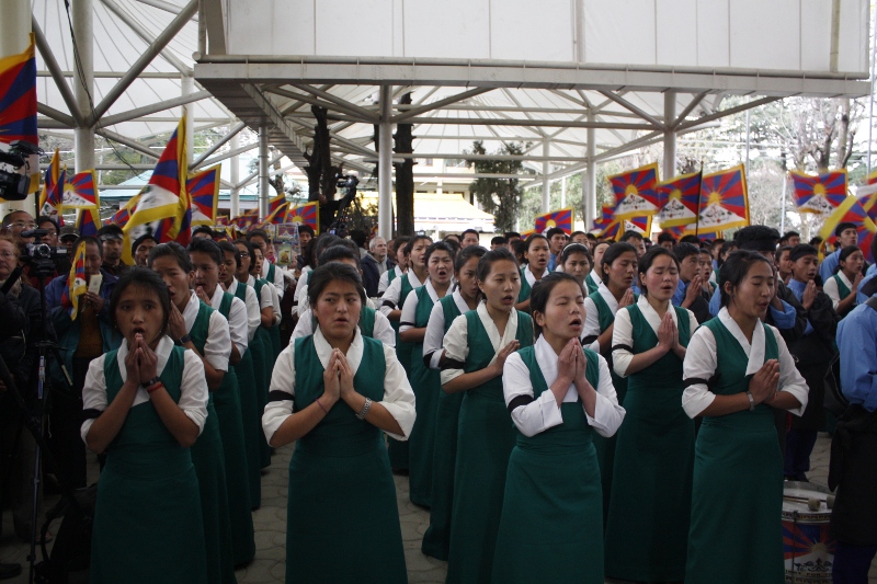 TCV school children offer prayers for all those Tibetans who have sacrificed their lives for Tibet during the 54th National Uprising Day in Dhramsala, India, on 10 March 2013