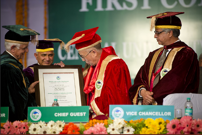 His Holiness the Dalai Lama being presented with an honourary degree of Doctor of Philosophy (honoris causa) by the chancellor of the Central University of Himachal Pradesh during their first convocation in Shahpur, HP, India on 28 February 2013/Photo/Tenzin Choejor/OHHDL