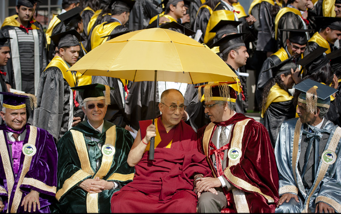 His Holiness the Dalai Lama flanked by the chancellor and vice-chancellor of the Central University of Himachal Pradesh during their first convocation in Shahpur, HP, India on 28 February 2013/Photo/Tenzin Choejor/OHHDL