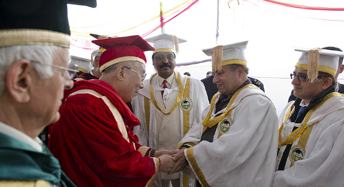 His Holiness the Dalai Lama being introduced to members of the academic procession on his arrival at the first convocation of Central University of Himachal Pradesh, Shahpur, HP, India, on 28 February 2013/Photo/Tenzin Choejor/OHHDL