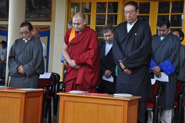 Officiating Sikyong Kalon Pema Chhinjor and Deputy Speaker Khenpo Sonam Tenphel take part in a minute's silence to express solidarity with and pray for all those Tibetans who have sacrificed their lives for the cause of Tibet