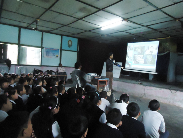 Dr. Tsewang giving a talk on oral hygiene to school children at Miao