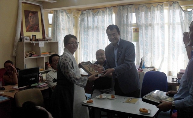 Health Kalon Dr Tsering Wangchuk presenting a stethoscope to the newly-appointed chief medical officer at the Tibetan settlement in Bir