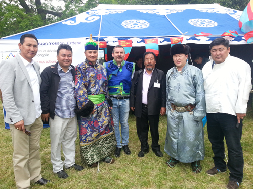 Representative Ngodup Dorjee (3rd from left) and Secretary Tsering Dhondup (2nd left) with participants from Mongolia during the festival