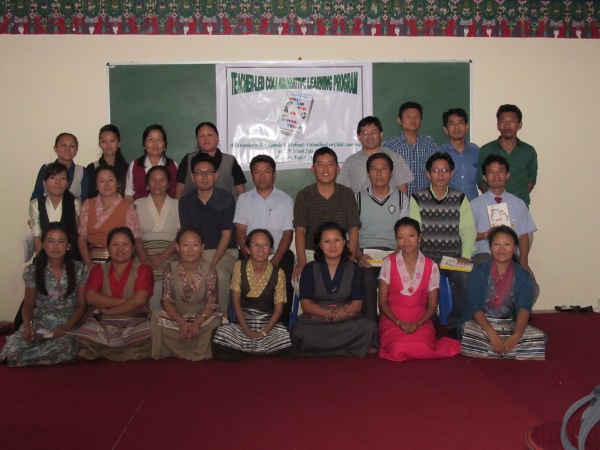 Participants with education officers Gyaltsen and Kelsang Wangdu at TCV Suja.