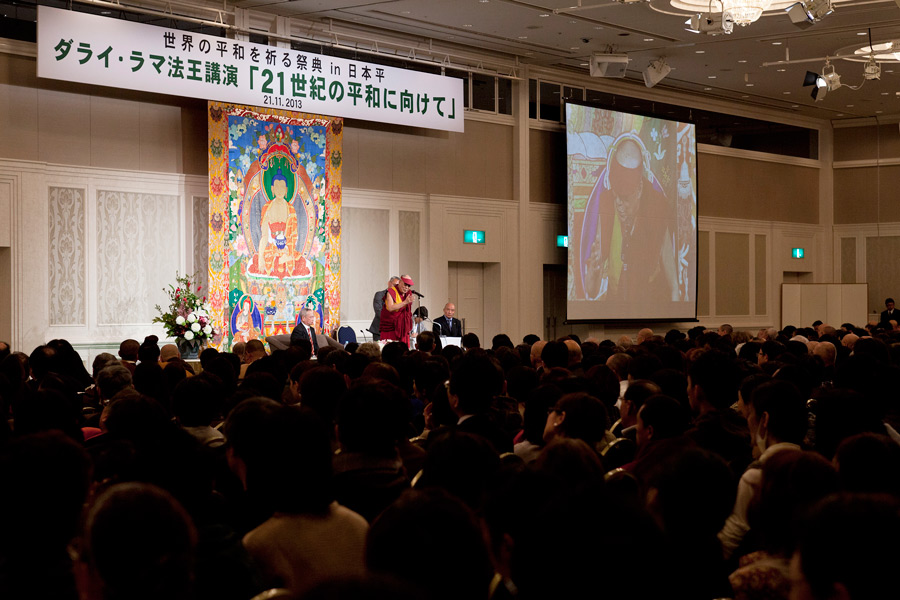 His Holiness the Dalai Lama speaking during his public talk on 'Shift to a Peaceful 21st Century' at the Century Hotel in Shizuoka, Japan on November 21, 2013. Photo/Office of Tibet, Japan