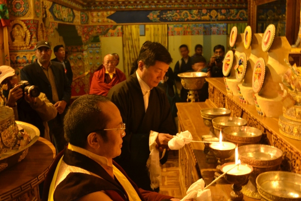 Tai Situ Rinpoche and Sikyong Dr Lobsang Sangay offering incense to the Buddha in the prayer hall of Sharabling.