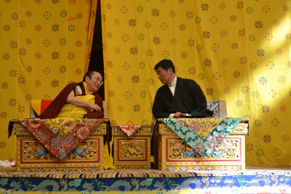 Tai Situ Rinpoche and Sikyong Dr Lobsang Sangay having a brief private interaction before addressing the monks.
