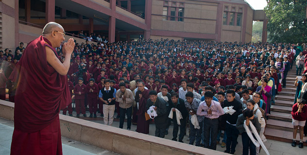 His Holiness the Dalai Lama greeting students before his talk at Vasant Valley School in New Delhi, India on December 6, 2013. Photo/Tenzin Choejor/OHHDL