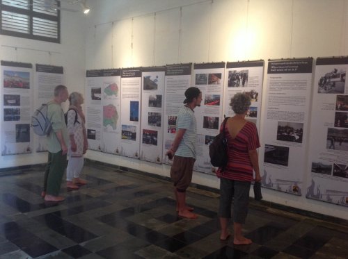 visitors at the photo exhibition conducted by the Tibet Museum at Auroville.