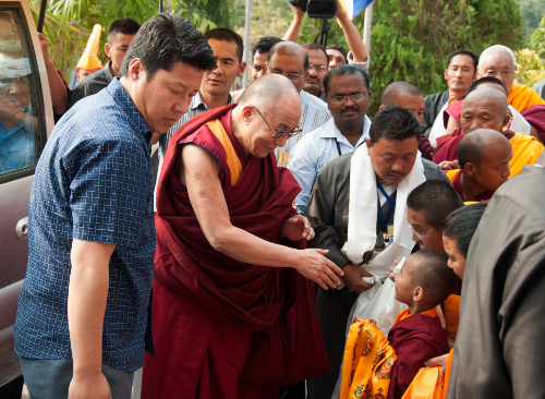 His Holiness greeting Tibetans on his arrival at Norgyeling settlement, Chattisgarh.