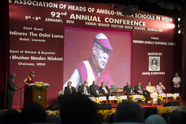 His Holiness the Dalai Lama delivering his address at the opening session of the Association of Heads of Anglo-Indian Schools in India's 92nd Annual Conference at Bishop Cotton School in Bangalore, India on January 5, 2014. Photo/Tenzin Choejor/OHHDL