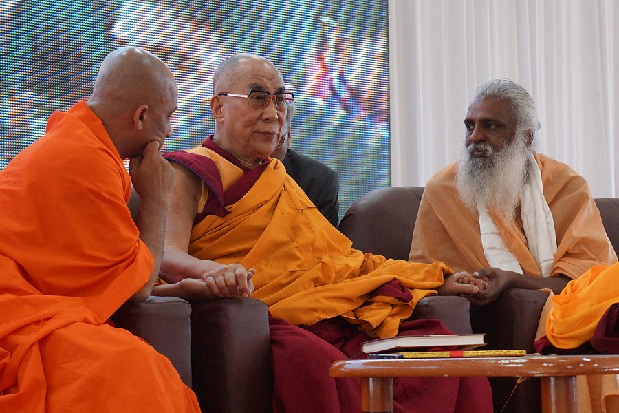 Swami Nirmaladantha, His Holiness the Dalai Lama and Swami Satyanand Maharaj on stage together during a program in Coimbatore, Tamil Nadu, India on January 7, 2014. Photo/Jeremy Russell/OHHDL