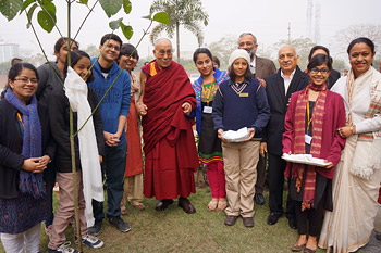 His Holiness the Dalai Lama with students and staff of the Step by Step School after planting a sapling in honor of his visit in Noida, NCR, India on January 31, 2014. Photo/Jeremy Russell/OHHDL
