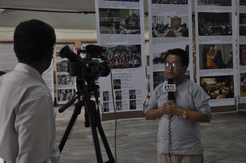 Mr Tashi Phuntsok from the Tibet Museum, speaking to a local TV channel about Tibet and the photo exhibition.
