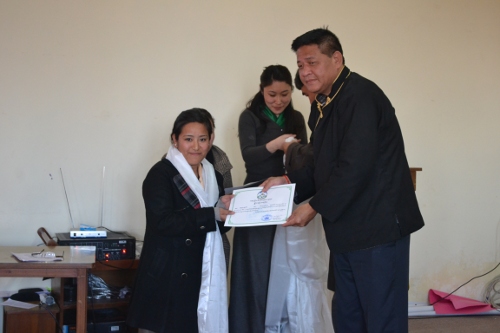 Speaker Penpa Tsering awarding the lawyer's certificate to a participant on Sunday, 5 January 2014.