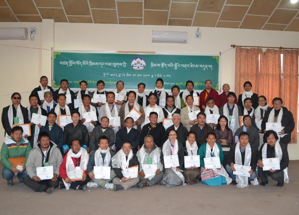 A group photo of the participants with Speaker Penpa Tsering, chief Justice Commissoner Ngawang Phelgyal Gyechen, justice commissioners and the staff of Tibetan Supreme Justice Commission.