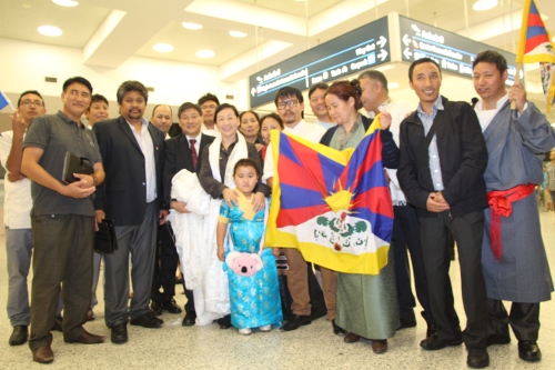 Members of the local Tibetan community and Representative Sonam Norbu Dagpo posing with Kalon Dicki Chhoyang on her arrival in Brisbane.