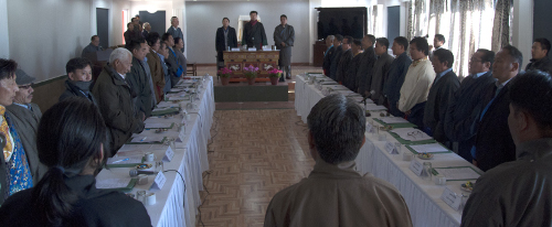 The participants observing a minute's silence as a mark of respect for the Tibetan self-immolaters during the inauguration of the two-day conference.