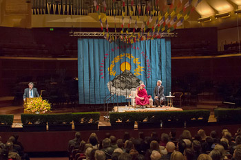 His Holiness the Dalai Lama being introduced by Richard Bloom before his talk at Davies Symphony Hall in San Francisco, California on February 22, 2014. Photo/American Himalayan Foundation