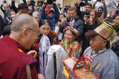 His Holiness the Dalai Lama receiving a traditional welcome on his arrival at the Tibetan Community Center in Richmond, California on February 23, 2014. Photo/Jeremy Russell