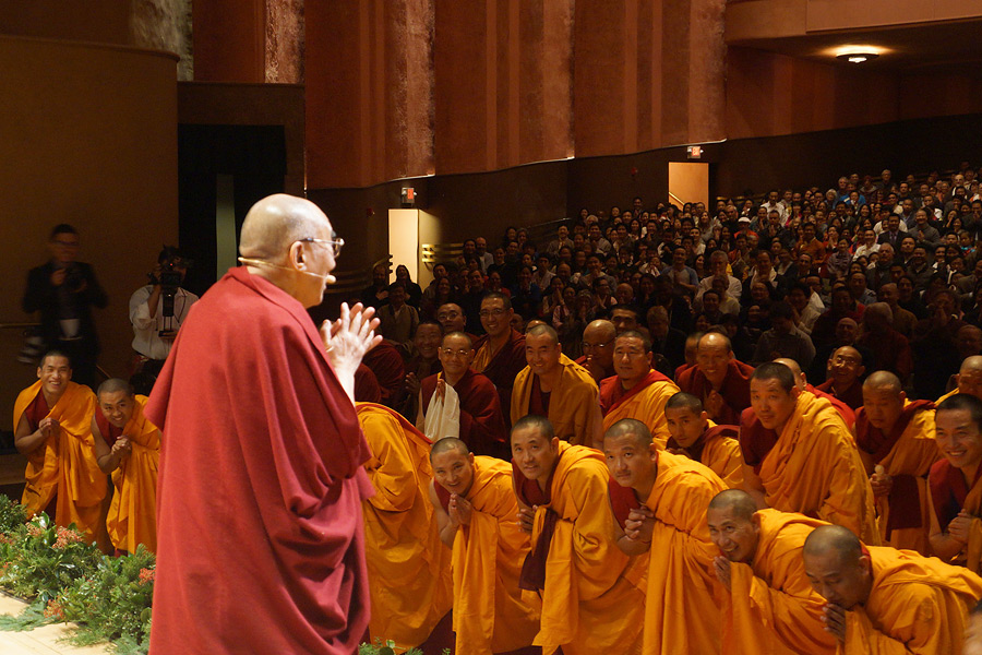 His Holiness the Dalai Lama greeting the audience on his arrival at the Berkeley Community Theater in Berkeley, California on February 23, 2014. Photo/Jeremy Russell