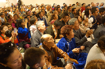 Members of the Tibetan community living in California listening to His Holiness the Dalai Lama speaking during their meeting in Los Angeles, California on February 27, 2014. Photo/Jeremy Russell/OHHDL