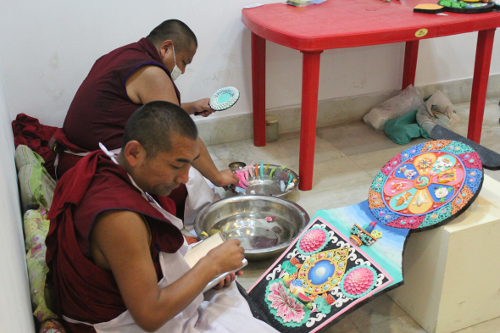 Tibetan Buddhist monks preparing butter sculptures during the festival in Guwahati.