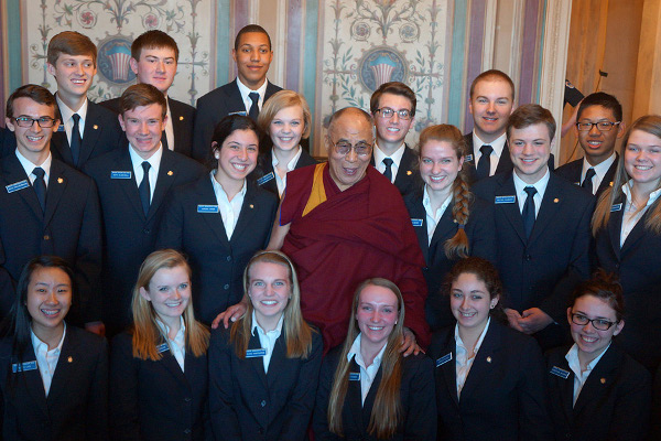 His Holiness the Dalai Lama posing with a group of interns during his visit to Capitol Hill in Washington DC on March 6, 2014. Photo/Jeremy Russell/OHHDL