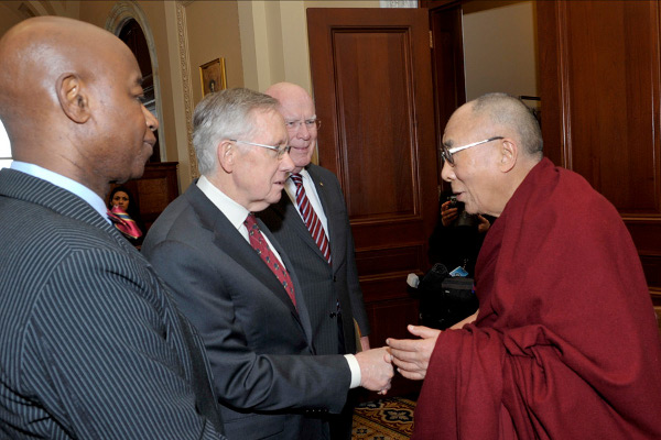 His Holiness the Dalai Lama greeting Senate Chaplain Barry Black, Senate Majority Leader Harry Reid (D-NV) and Sen. Sherrod Brown (D-OH) on his arrival at Capitol Hill in Washington DC on March 6, 2014. Photo/Sonam Zoksang