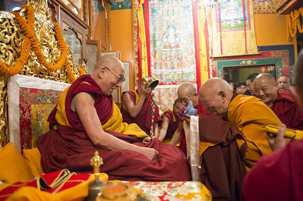A senior monk making traditional offerings at the start of the Long Life Prayer for His Holiness the Dalai Lama at Nechung Monastery in Dharamsala, India on March 11, 2014. Photo/Tenzin Choejor/OHHDL