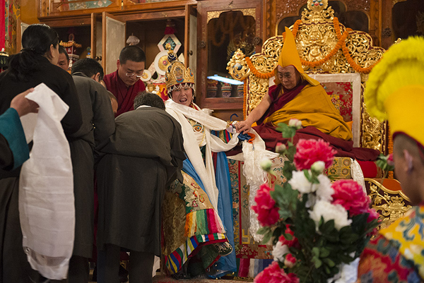 Oracle Tsering Chengna giving blessing during the Long Life Prayer for His Holiness the Dalai Lama at Nechung Monastery in Dharamsala, India on March 11, 2014. Photo/Tenzin Choejor/OHHDL