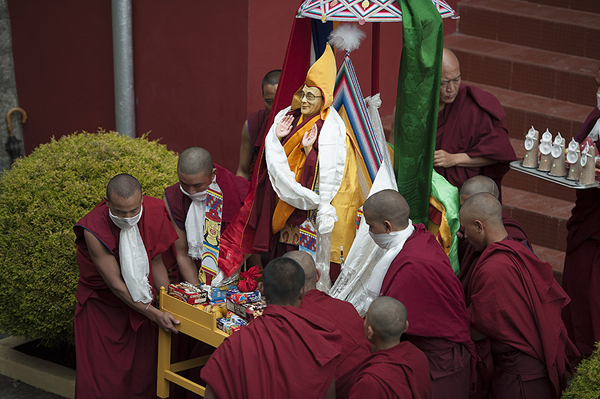 Monks carrying a likeness of His Holiness the Dalai Lama during Long Life Prayers for His Holiness at Nechung Monastery in Dharamsala, India on March 11, 2014. Photo/Tenzin Choejor/OHHDL