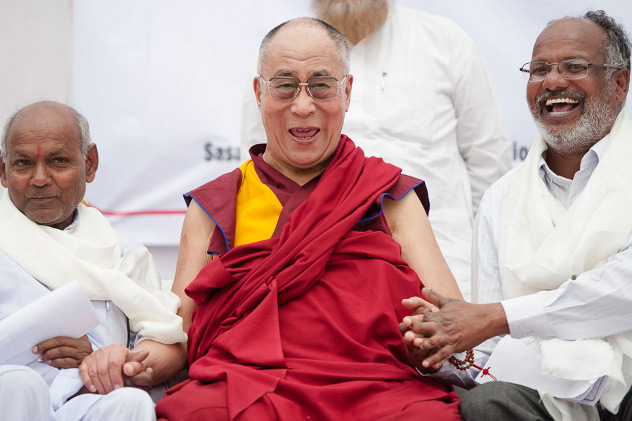 His Holiness the Dalai Lama with members of the Tahirpur Leprosy Complex in New Delhi, India on March 20, 2014. Photo/Tenzin Choejor/OHHDL