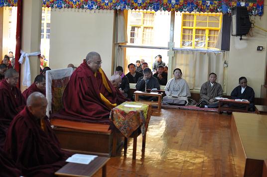 The abbot of Namgyal monastery presiding over the prayer service at Tsuglakhang, 8 March 2014. DIIR Photo/ Tenzin Phende