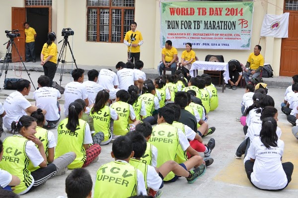 Health Kalon Dr Tsering Wangchuk (1st left) speaking a “Run for TB” event organised by the Health Department in Dharamshala on 23 March 2014/DIIR photo/Tenzin Phende