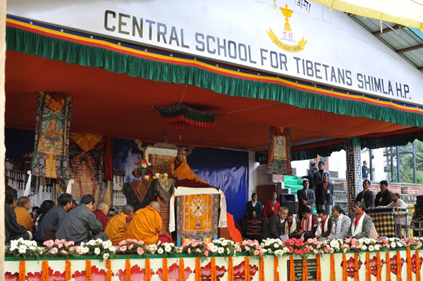 His Holiness the Dalai Lama giving a teaching at the Central School for Tibetans in Shimla, India, on 18 March 2014/DIIR photo/Tenzin Phende