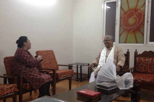 Kalon Dolma Gyari meets Mr Bhayaji Joshi, a senior RSS functionary, in New Delhi, on 18 May 2014