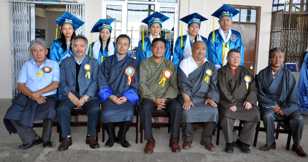 Graduating students posing with the dignitaries after the ceremony. (DIIR Photo)