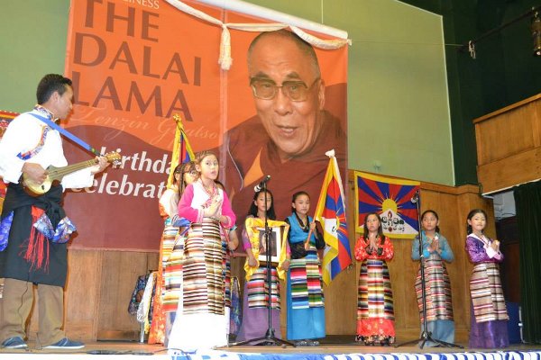 Tibetan children performing Tibetans cultural songs on the occasion.