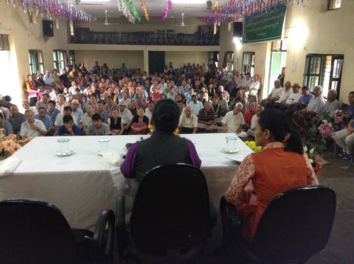 DIIR Kalon addressing Dekyiling Settlement residents in Dehra Dun.
